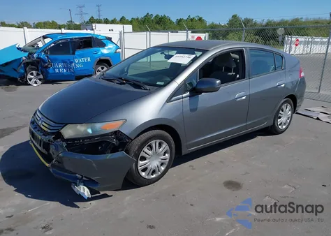 2011 Honda Insight from USA, damaged, VIN JHMZE2H32BS003362